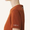 Camiseta de algodón con detalle de cinta Camiseta de algodón con detalle de cinta