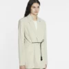 Chaqueta con cinturón de mezcla de lana