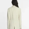 Chaqueta con cinturón de mezcla de lana