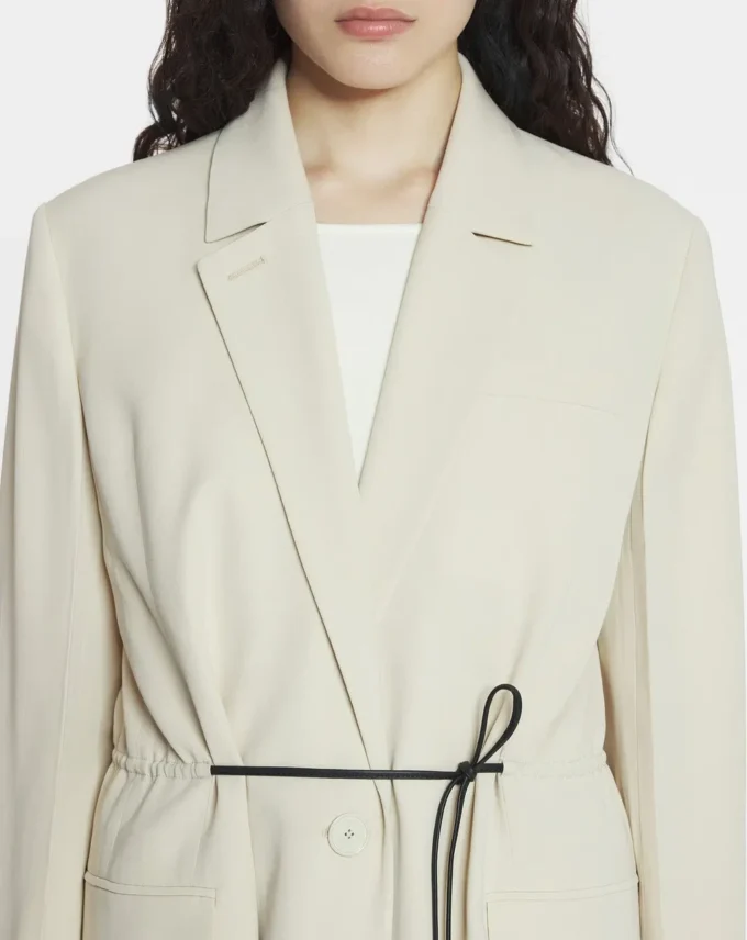 Chaqueta con cinturón de mezcla de lana