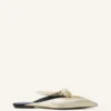 Mules Midnight Step Bow en piel metalizada