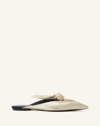 Mules Midnight Step Bow en piel metalizada Mules Midnight Step Bow en piel metalizada