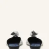 Mules Midnight Step Bow en piel metalizada