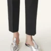 Mules Midnight Step Bow en piel metalizada