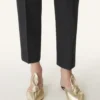 Mules Midnight Step Bow en piel metalizada