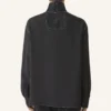 Top de cuello alto de seda Top de cuello alto de seda
